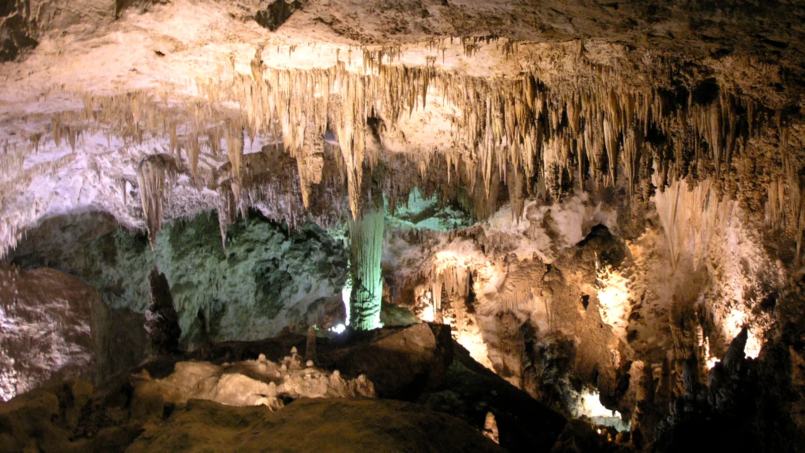 Stalactites and illuminated cave formations inside Carlsbad Cavern