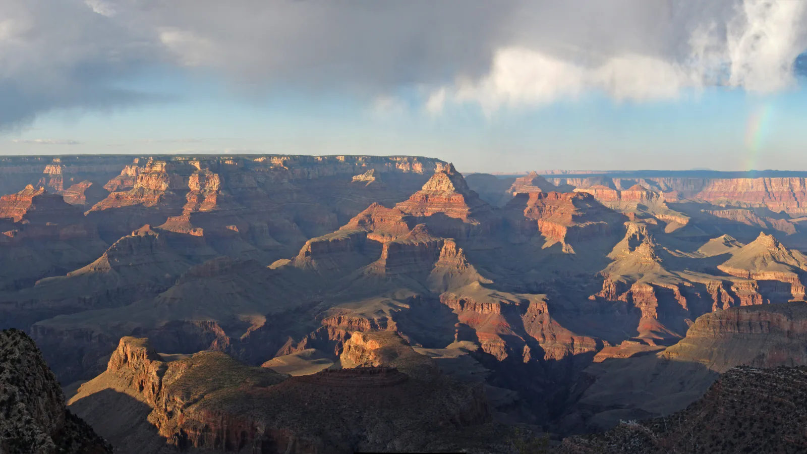 Sunset and a faint rainbow at Grandview Point in Grand Canyon National Park