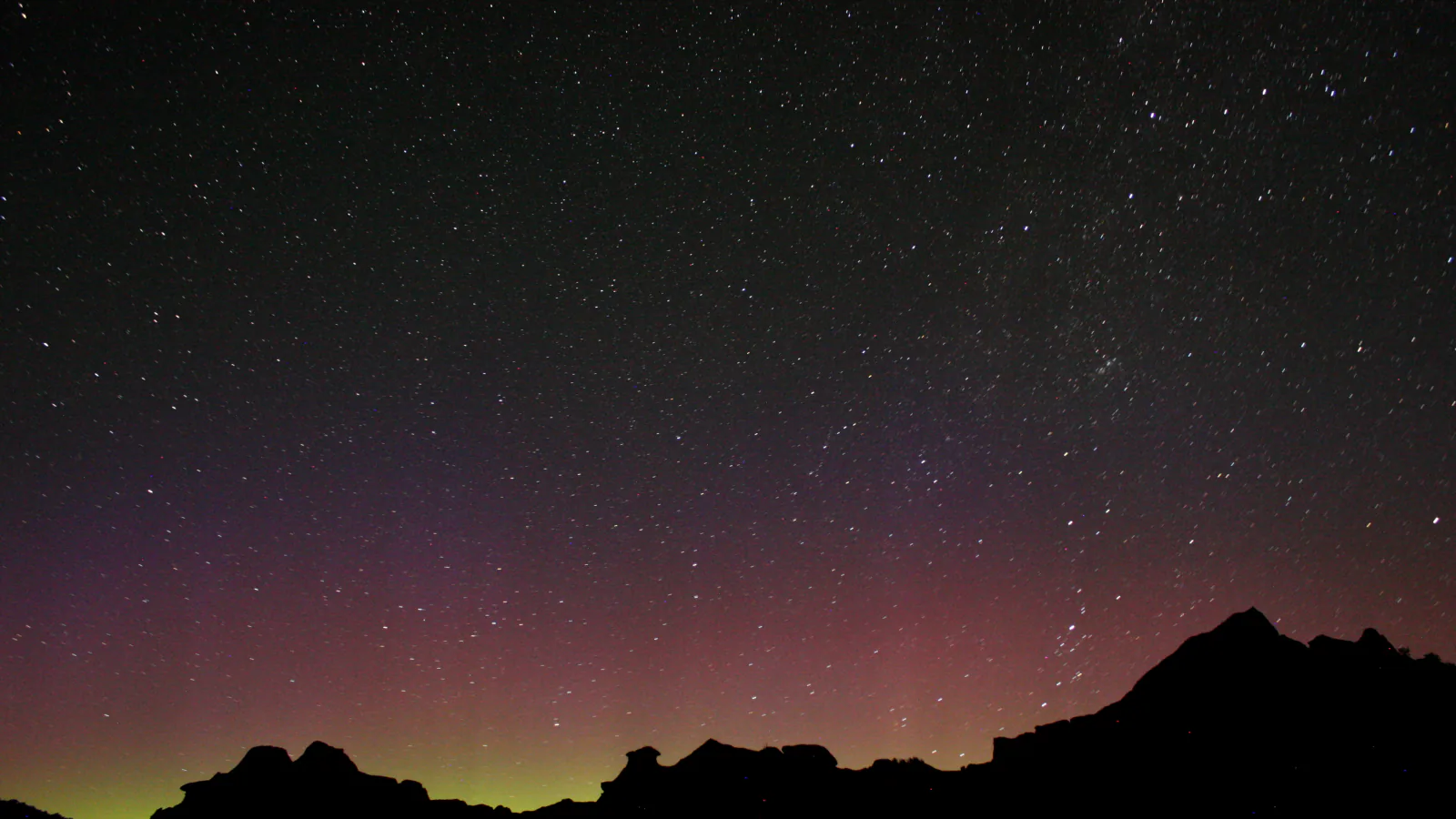 Aurora borealis above the Big Plateau in Theodore Roosevelt National Park