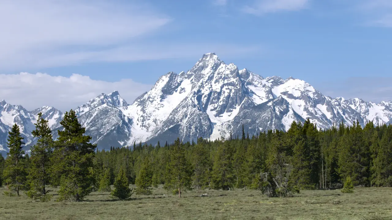 Grand Teton mountain range beneath a clear sky