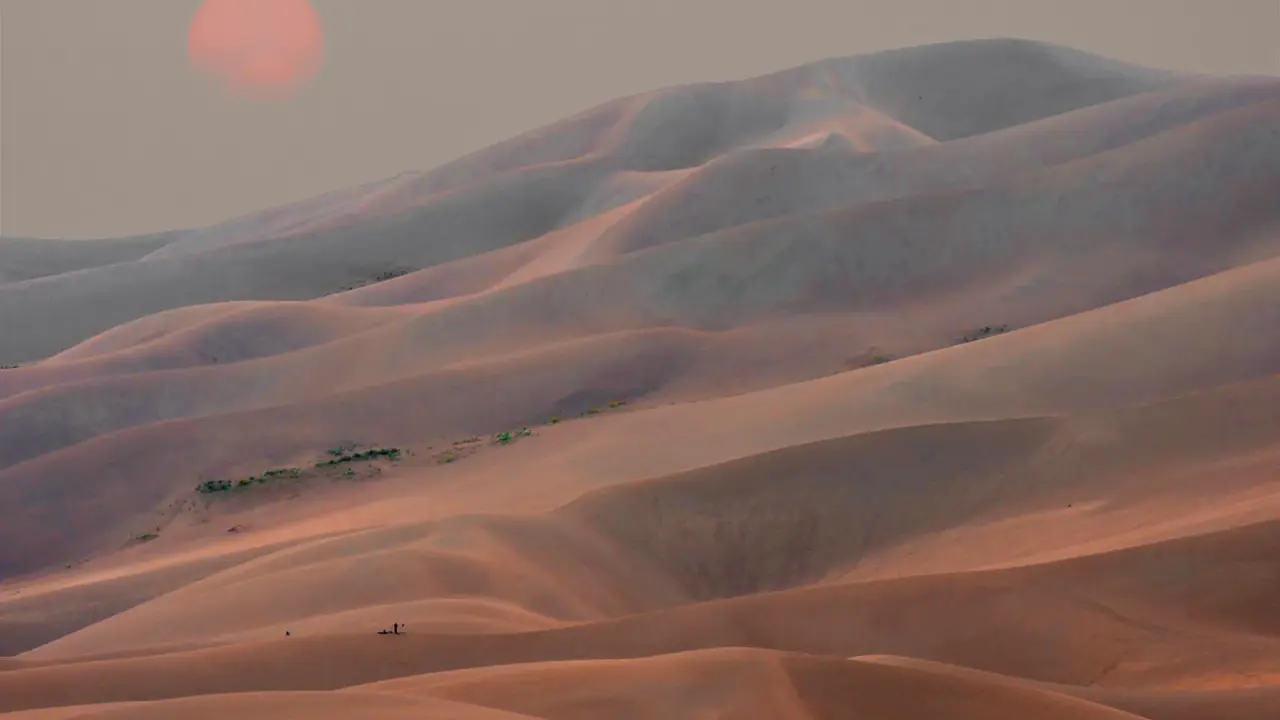 Smoky sunset above Great Sand Dunes National Park