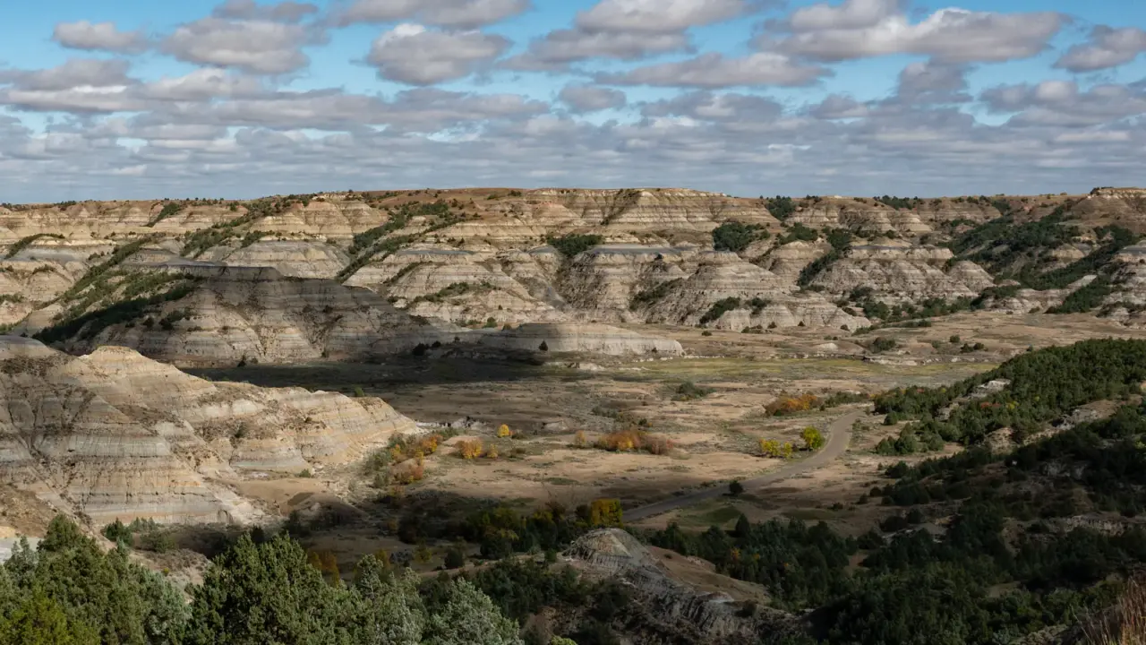Sunlight crossing the valley in Theodore Roosevelt National Park